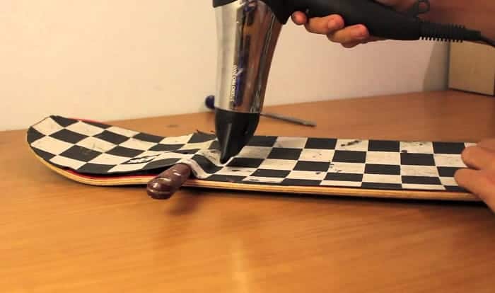 how to remove grip tape from a skateboard