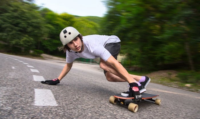 how to slide a longboard