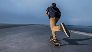 ride-a-skateboard-on-the-sidewalk